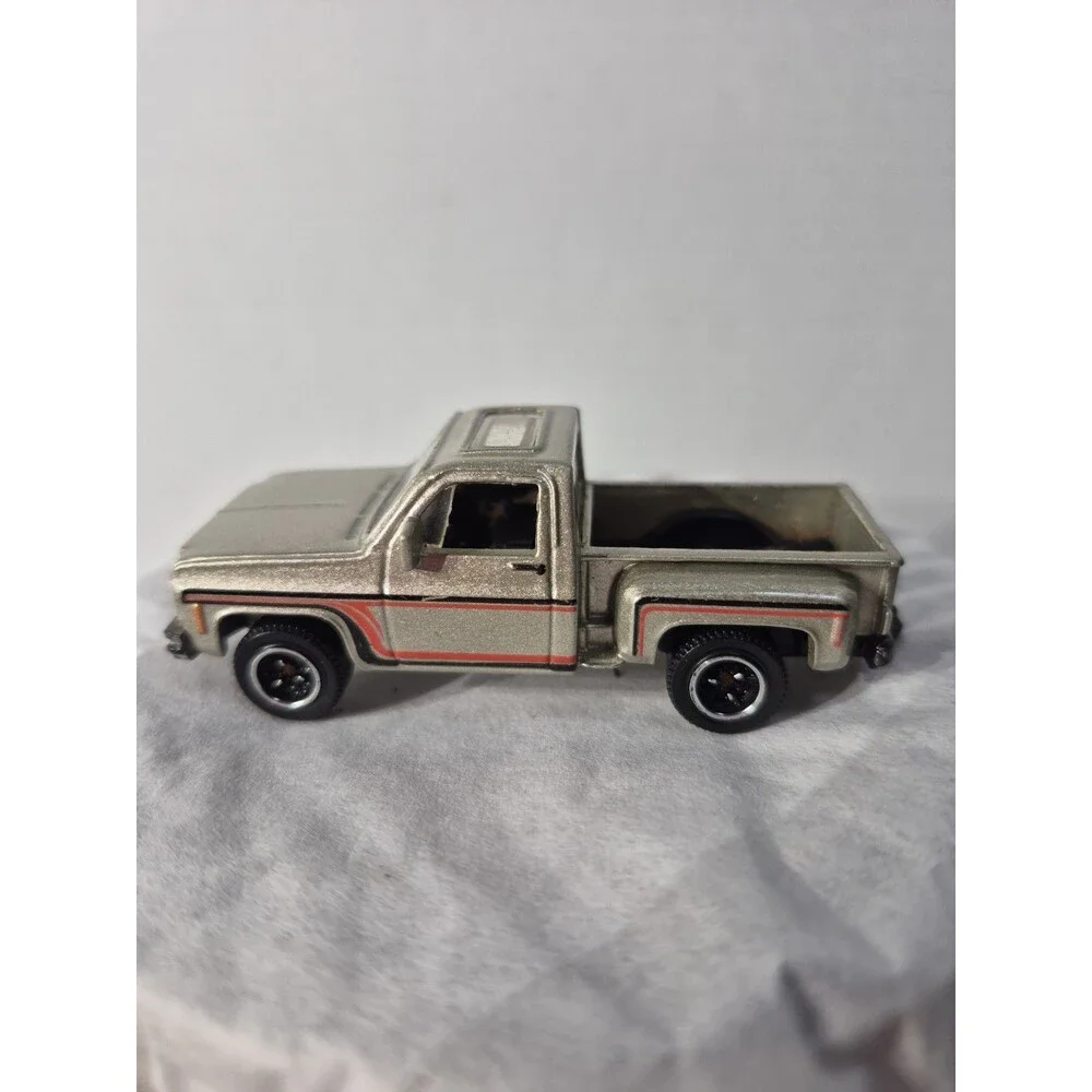 1/64 Scale 1975 Chevy Stepside Diecast Pickup Truck - Matchbox MB76 R5000 Gold